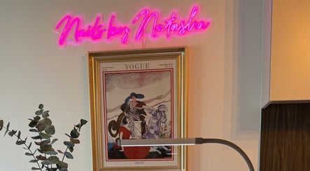 Elegant Nails By Natasha neon sign and framed artwork, showcasing style in Dorval, Quebec, CA.