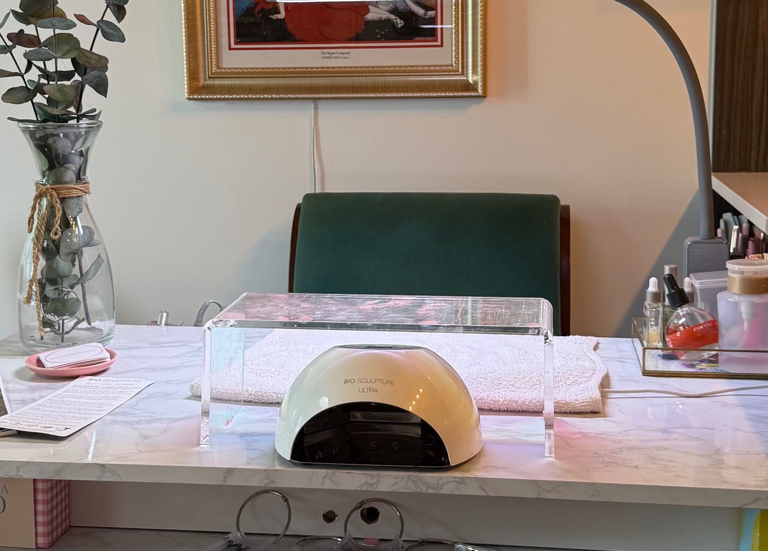 Manicure setup at Nails By Natasha in Dorval, Quebec, CA featuring tools and a relaxing setting.