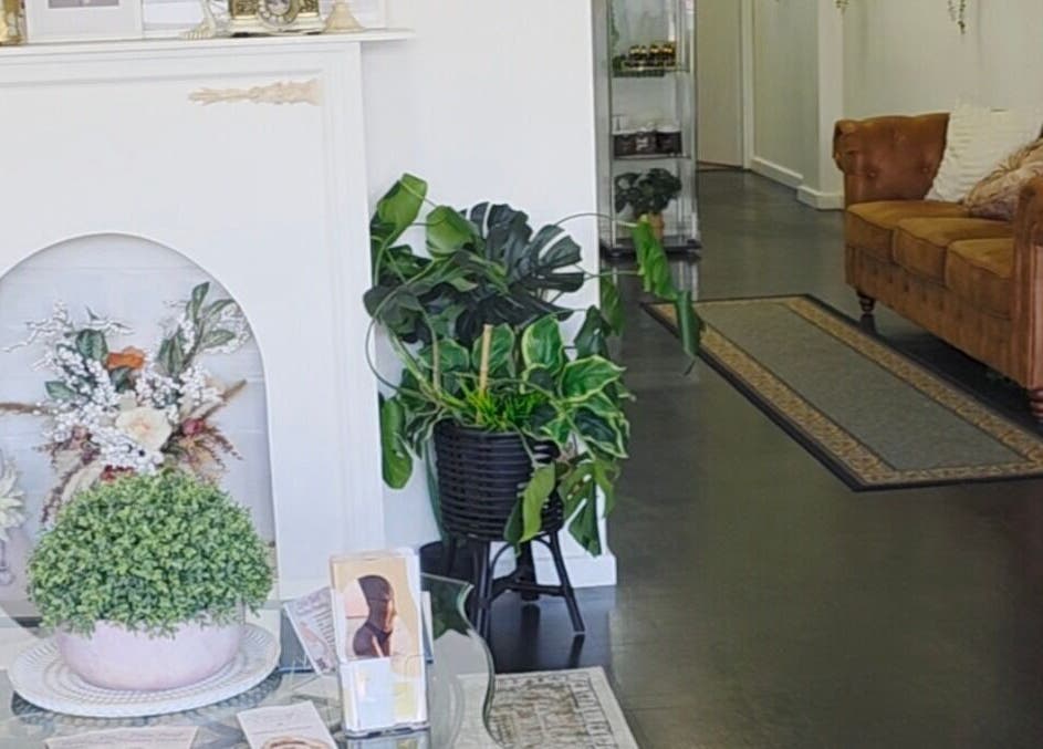 Inviting lounge area at The Derma Lab in Mandurah, Western Australia, AU. Features elegant decor and comfortable seating.