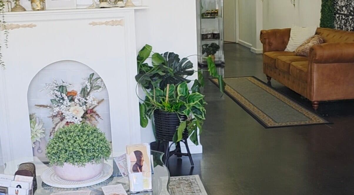 Inviting lounge area at The Derma Lab in Mandurah, Western Australia, AU. Features elegant decor and comfortable seating.