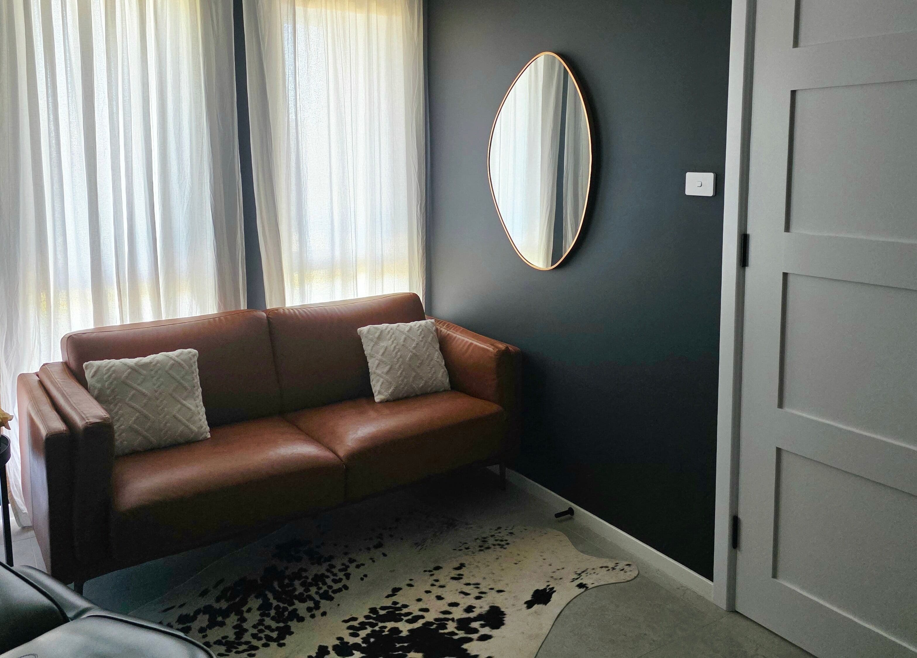 Inviting lounge area at Beauty Therapeutics, Oran Park, New South Wales, AU, featuring elegant decor.