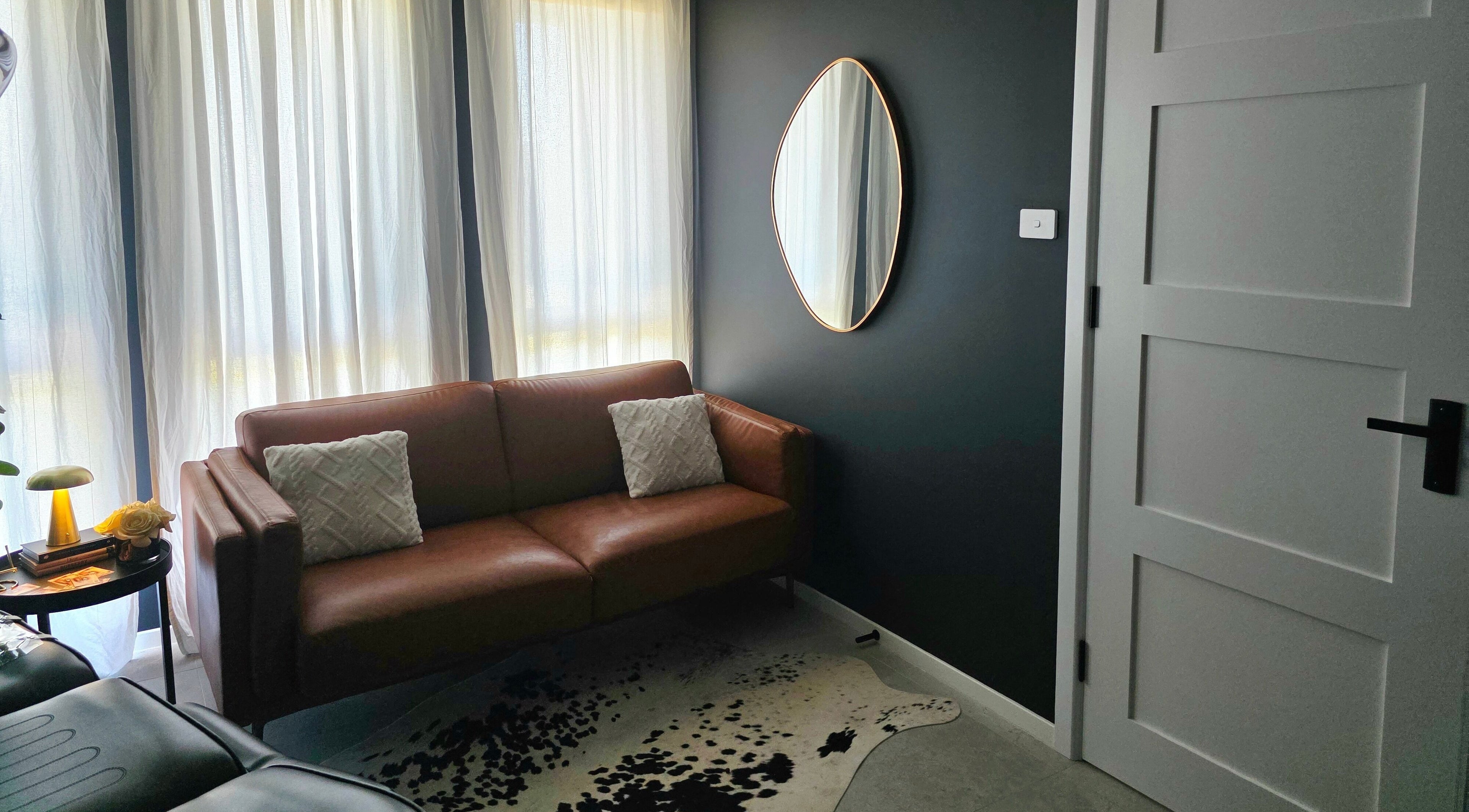 Inviting lounge area at Beauty Therapeutics, Oran Park, New South Wales, AU, featuring elegant decor.