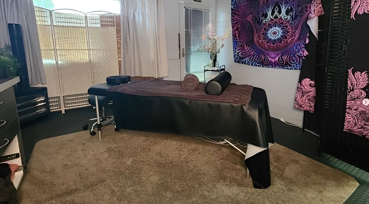 Jewlz Beauty, Palmerston North, NZ: Cozy massage room with ambient decor for relaxation and wellness.