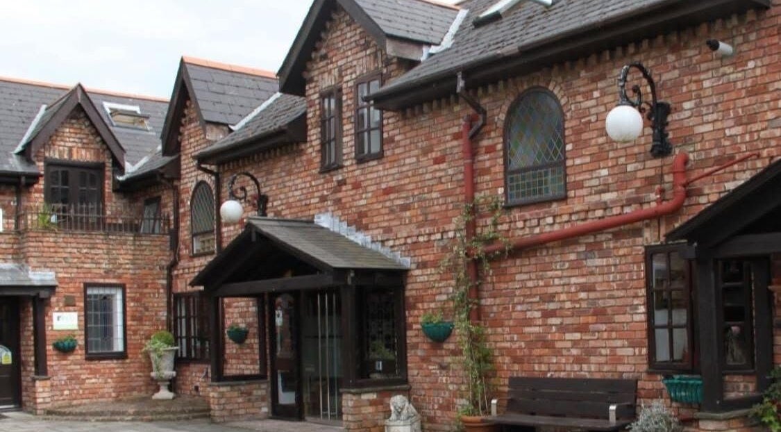 Exterior view of Zen Botanica, a rustic brick building in Barry, Wales, GB, ideal for wellness and beauty services.