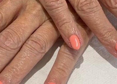 Manicure with coral polish at Zen Botanica, Barry, Wales, GB.
