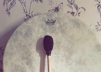 Buffalo drum with mallet at Anna Casey Holistic Bodywork, Newcastle upon Tyne, England, GB.