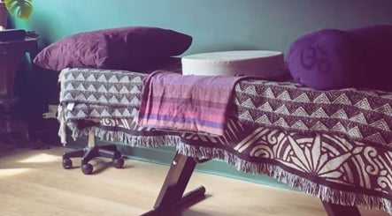Massage table at Anna Casey Holistic Bodywork, Newcastle upon Tyne, England, GB, offering calming wellness services.