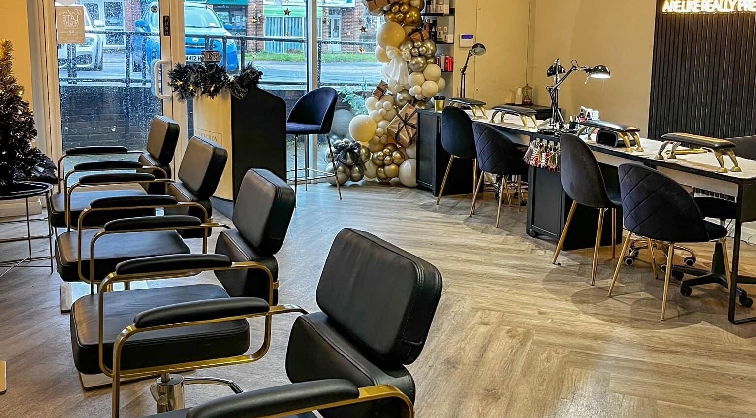 Modern salon chairs and nail stations at Polished Perfection Hair and Beauty Salon, Clanfield, England, GB.