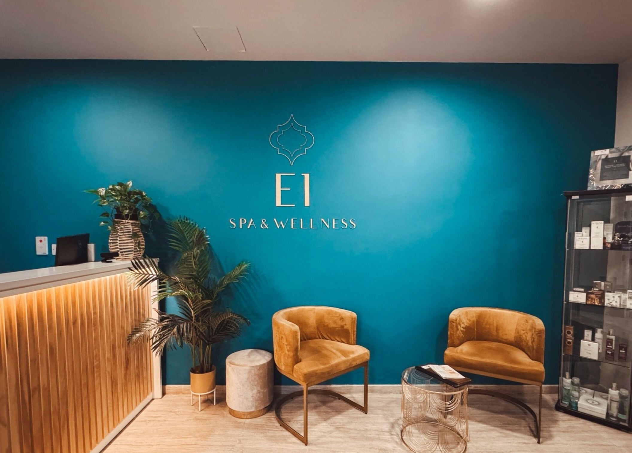 E1 Spa and Wellness reception area in Gibraltar, GI with stylish seating and decor.