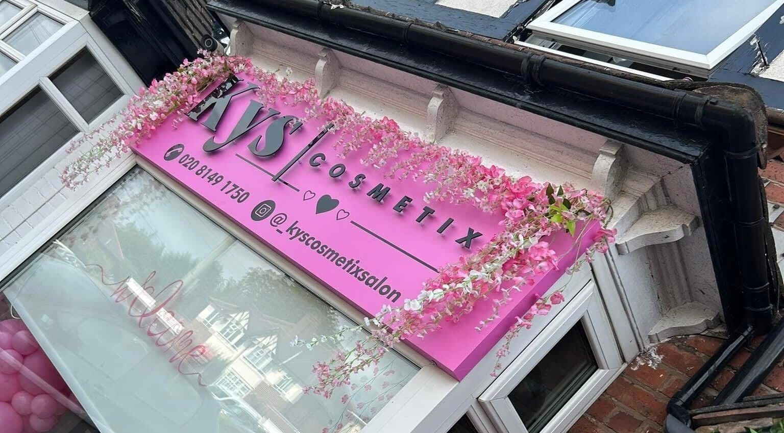 Exterior close-up of Cc Styled It venue in Birmingham, England, GB with floral decoration.