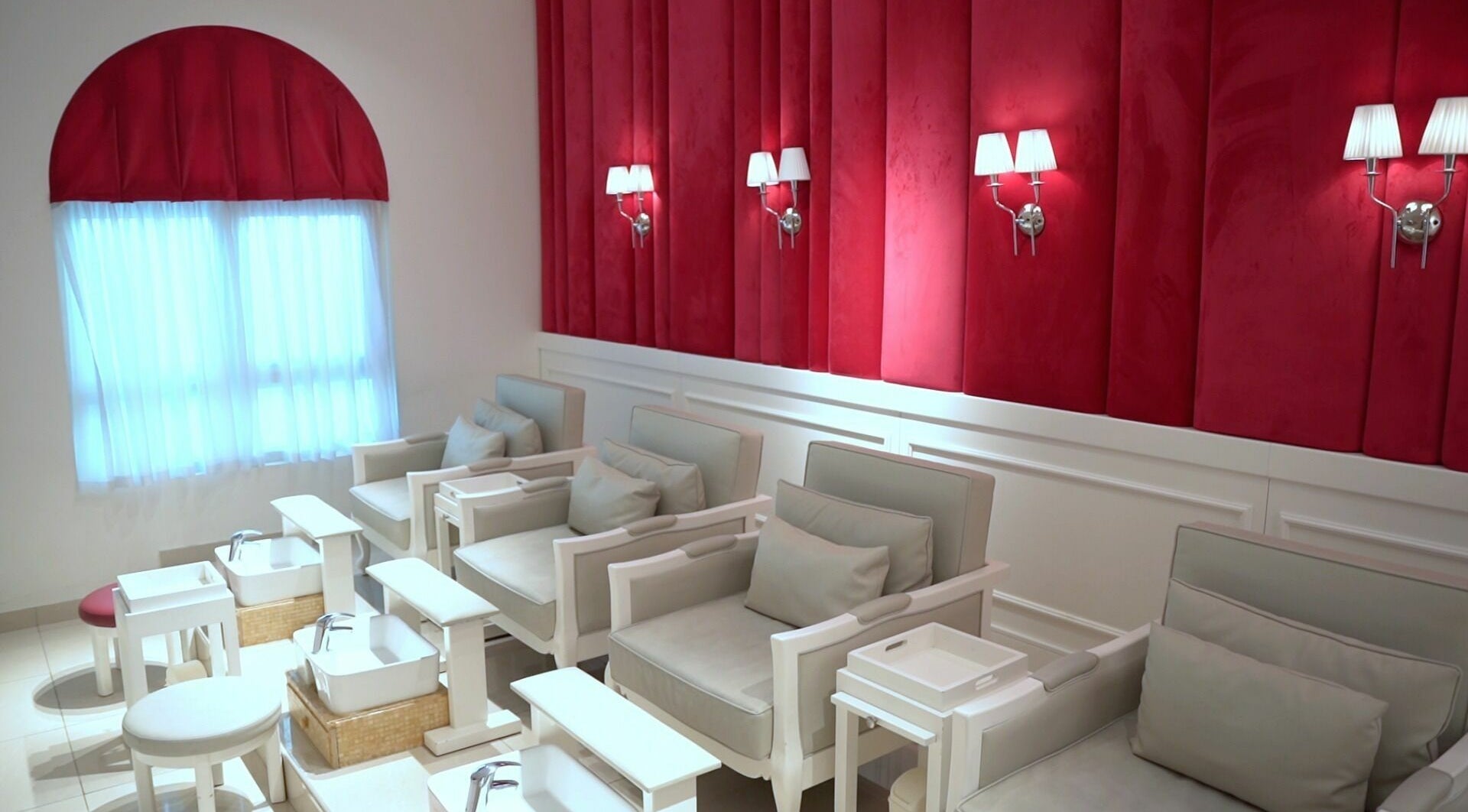 Luxurious pedicure seats at Shatha Beauty Centre in Sharjah, AE, showcasing modern elegance and comfort.