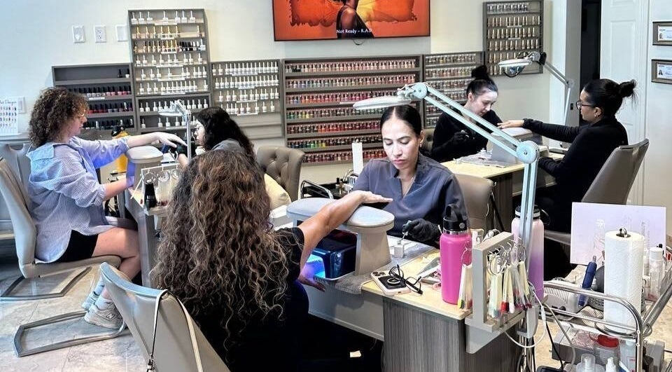 Clients enjoying manicures at Tat's Nails Scottsdale, a premier nail salon in Scottsdale, Arizona, US.