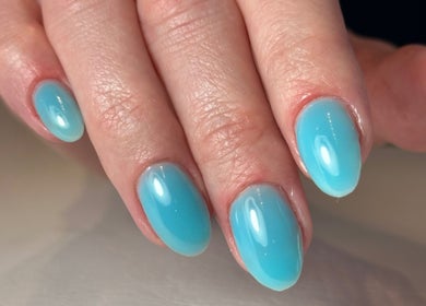 Elegant aqua gel nails at Tat's Nails Scottsdale, located in Scottsdale, Arizona, US. Perfect for a stylish look.