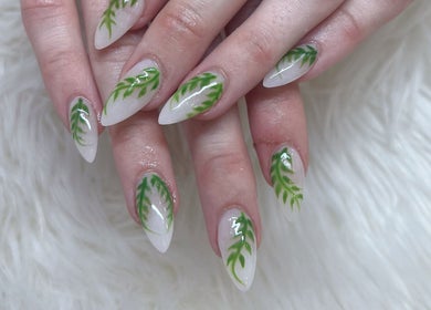 Elegant nail art with green leaf design from Happy Nail South Yarra in Melbourne, Victoria, AU.