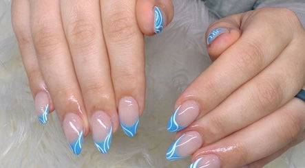 Elegant blue nail art at Happy Nail South Yarra, Melbourne, Victoria, AU, showcasing intricate designs.