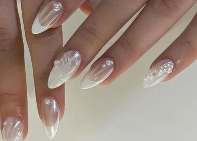 Elegant pearl-accented nails at Happy Nail South Yarra, Melbourne, Victoria, AU. Perfectly styled manicure.