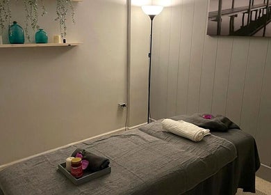 Calming massage room at Tranquil Massage Fuengirola, Fuengirola, Andalucía, ES with a neatly set massage table.