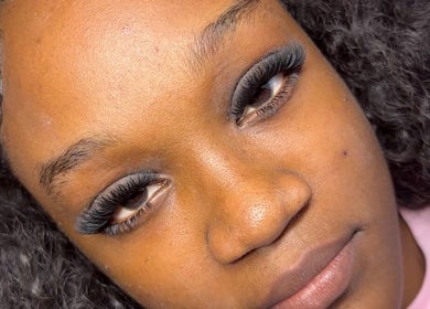 Close-up of client with voluminous eyelashes at Nya Beauty Studioo, Sliver Sands Christ Church, BB.