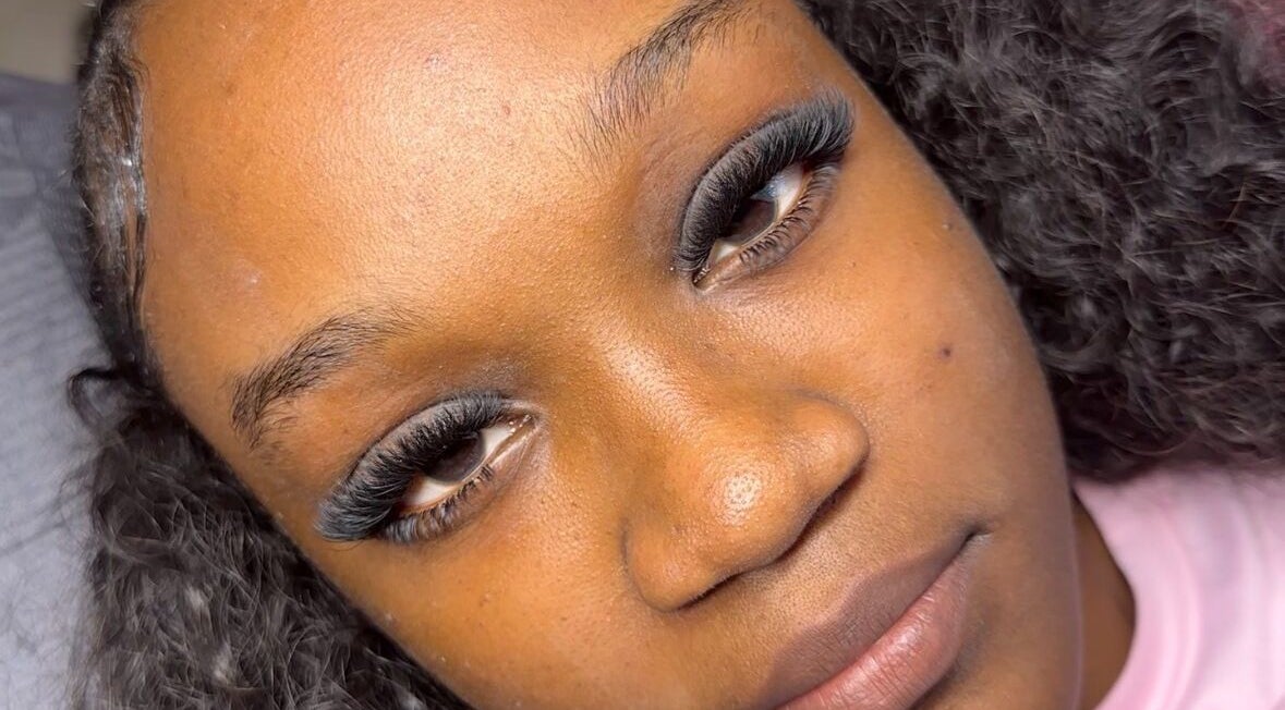 Close-up of client with voluminous eyelashes at Nya Beauty Studioo, Sliver Sands Christ Church, BB.
