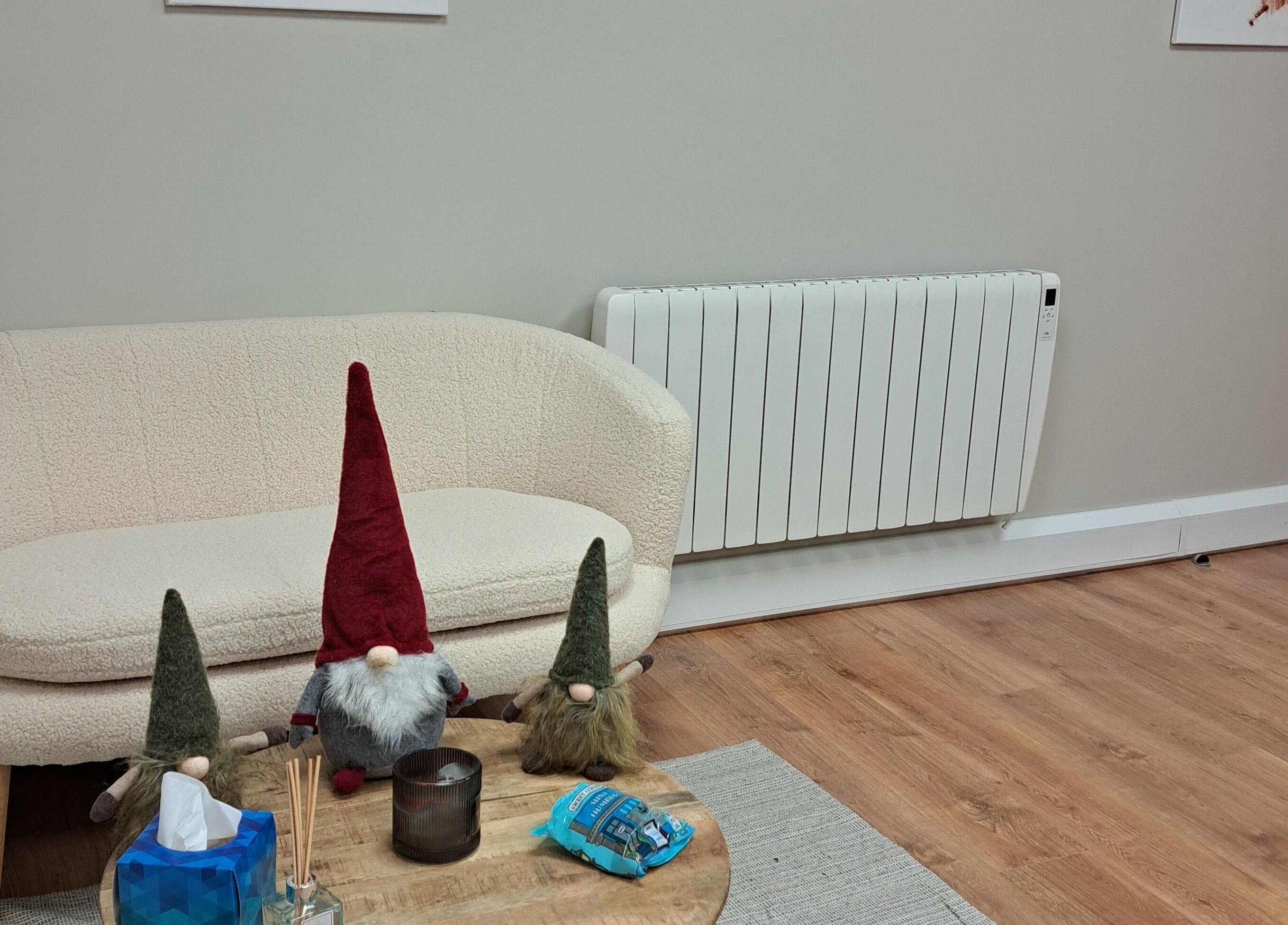 Comfortable lounge area at JH Specialised Waxing, Carrickmines, County Dublin, IE, featuring decorative gnomes.