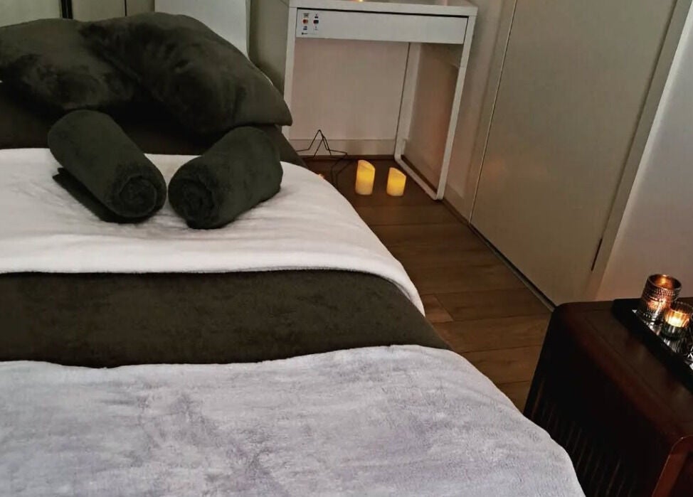 Tranquil waxing room at JH Specialised Waxing, Carrickmines, County Dublin, IE, with cozy linens and ambient lighting.