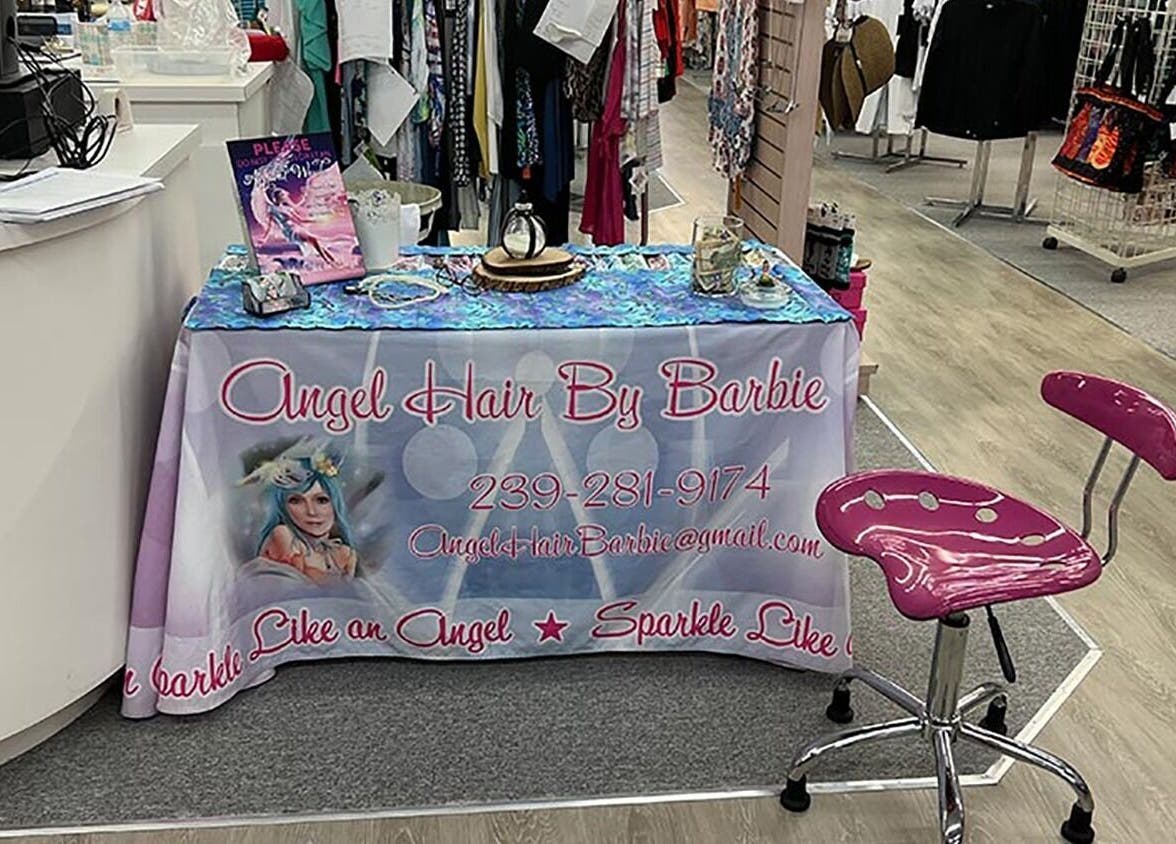 AngelHairBarbie-Golf4Less booth in Fort Myers, Florida, US showcasing hair products and decor.