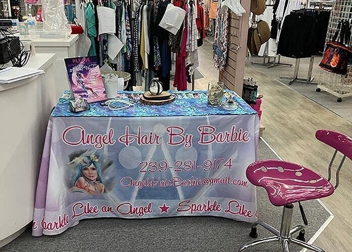 AngelHairBarbie booth at TerraWalkBabcockRanch, Alva, Florida, US showcasing hair products.