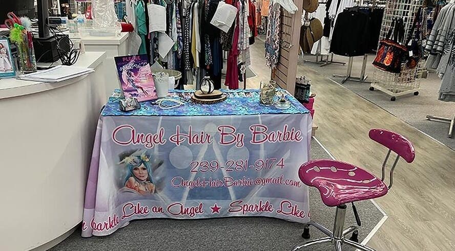 AngelHairBarbie booth at TerraWalkBabcockRanch, Alva, Florida, US showcasing hair products.
