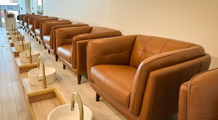 Luxurious pedicure chairs at Sweetling Nails and Spa, Ottawa, Ontario, CA, offering relaxing spa services.