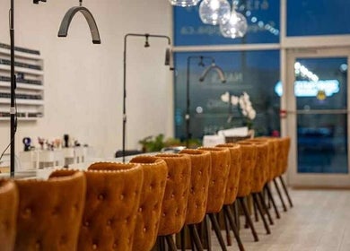 Luxurious seating at Sweetling Nails and Spa, Ottawa, Ontario, CA, featuring elegant leather chairs.