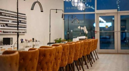 Luxurious seating at Sweetling Nails and Spa, Ottawa, Ontario, CA, featuring elegant leather chairs.