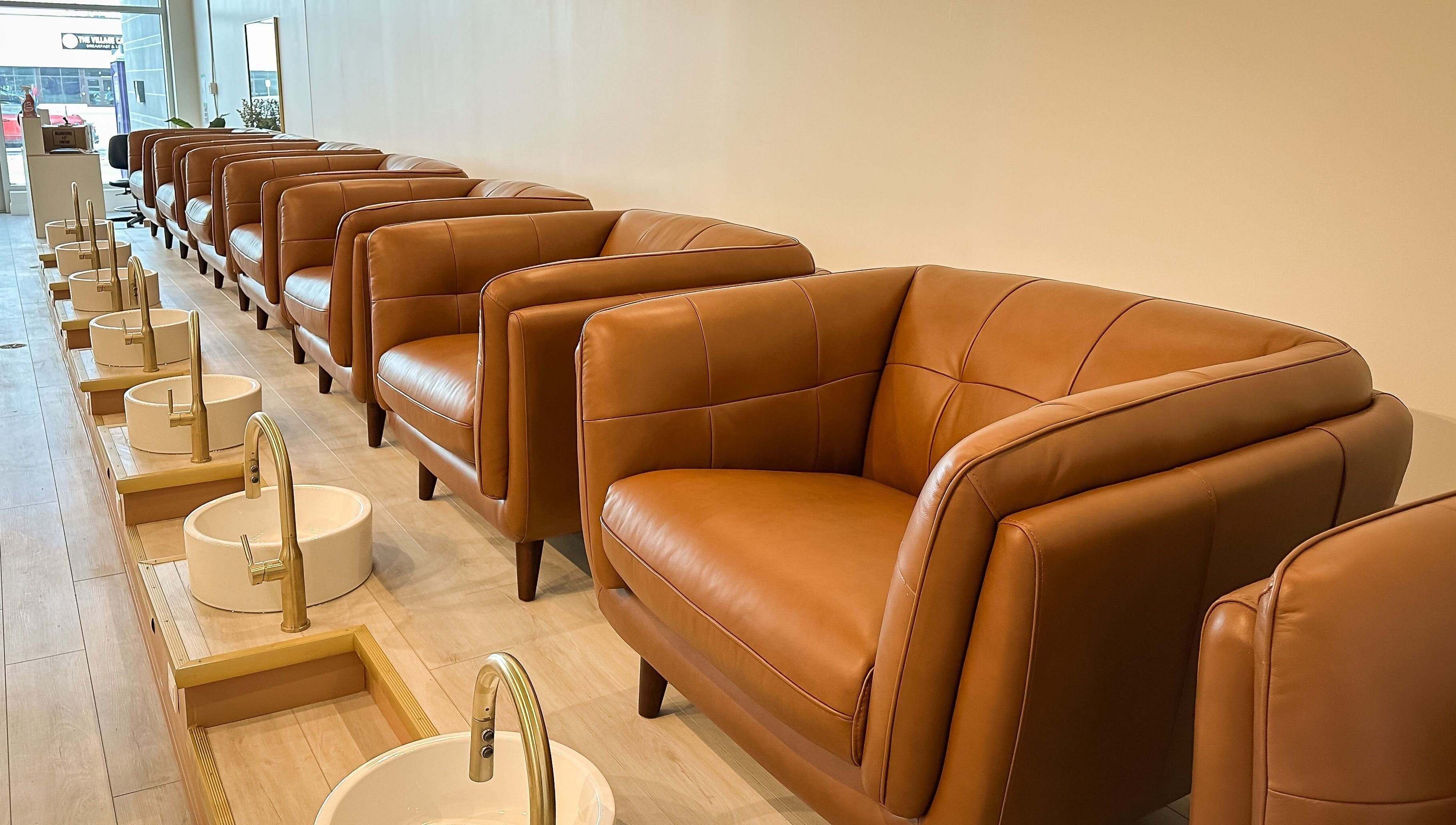 Luxurious pedicure chairs at Sweetling Nails and Spa in Ottawa, Ontario, CA, offer comfort and style.