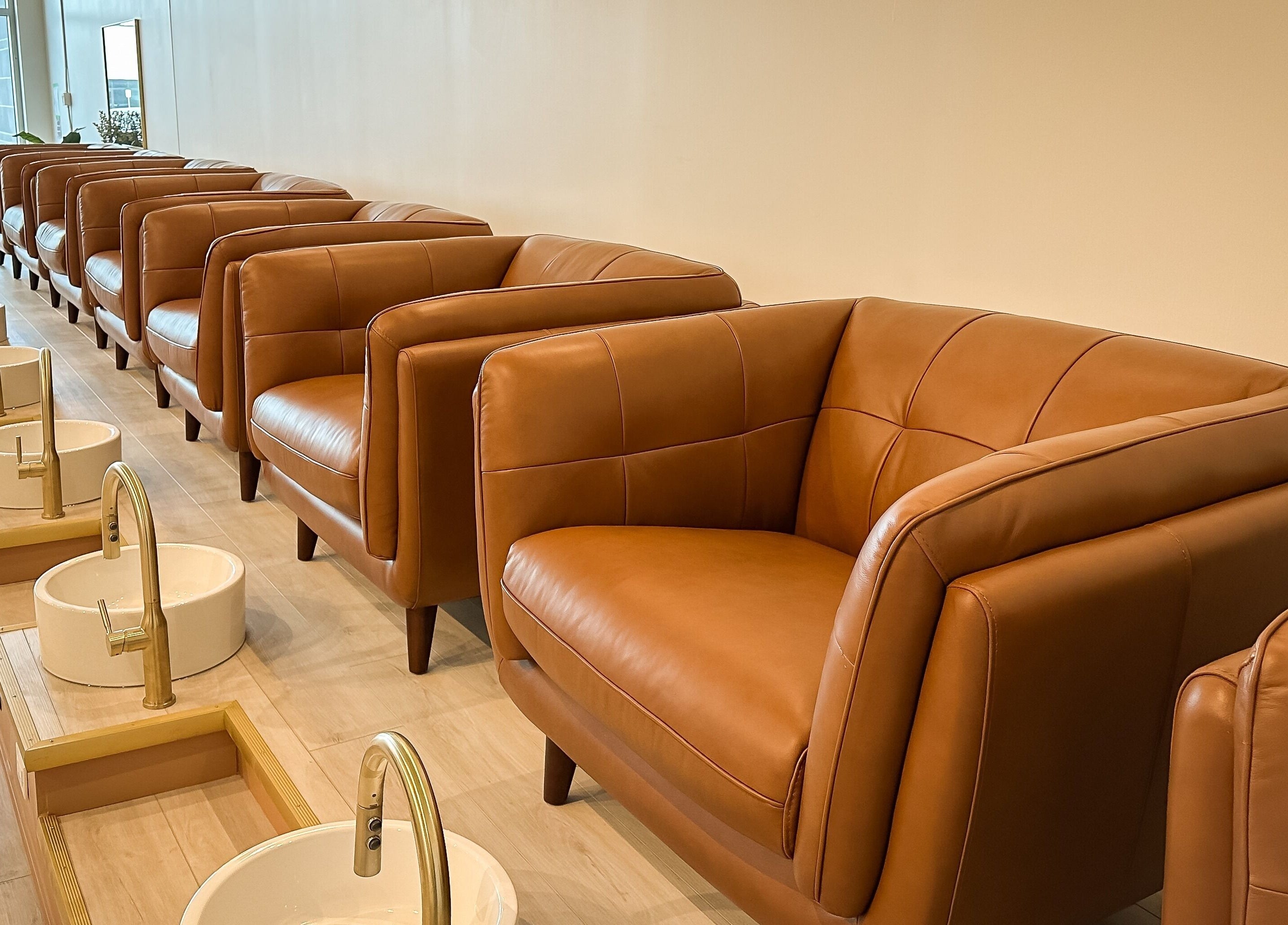 Luxurious pedicure chairs at Sweetling Nails and Spa in Ottawa, Ontario, CA, offer comfort and style.
