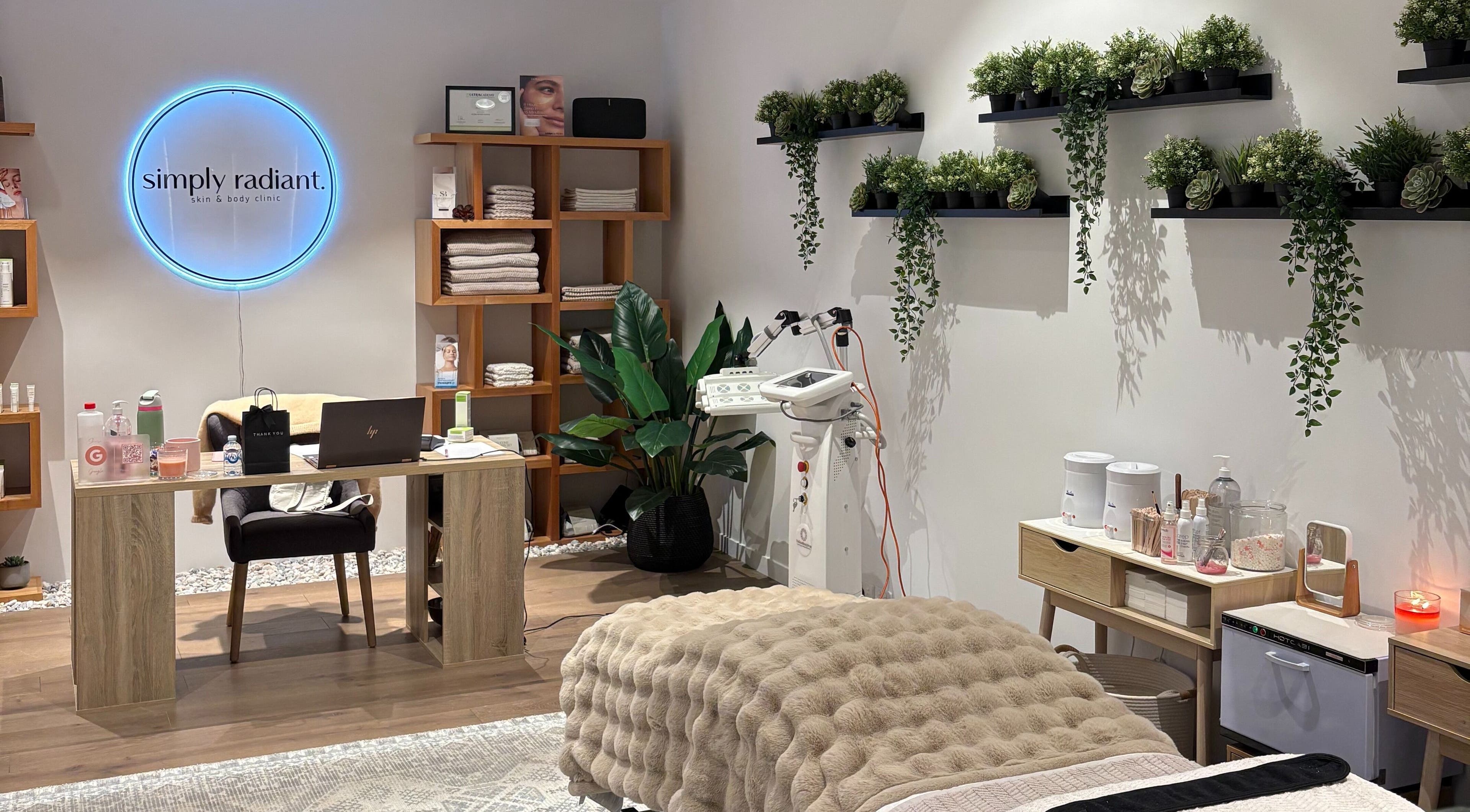 Simply Radiant Skin and Body Clinic in Melbourne, Victoria, AU, featuring a cozy treatment room with natural decor.