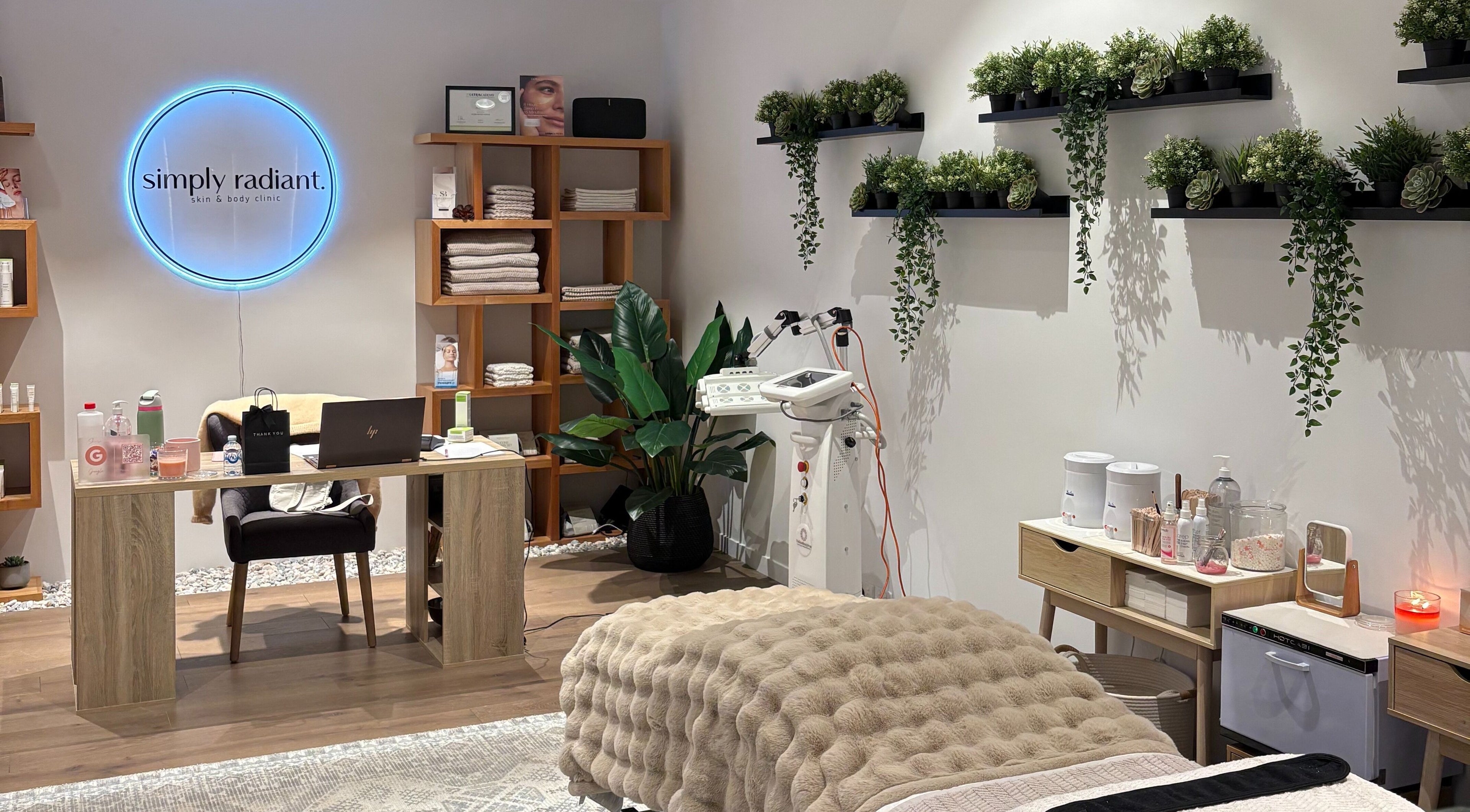 Simply Radiant Skin and Body Clinic in Melbourne, Victoria, AU, featuring a cozy treatment room with natural decor.