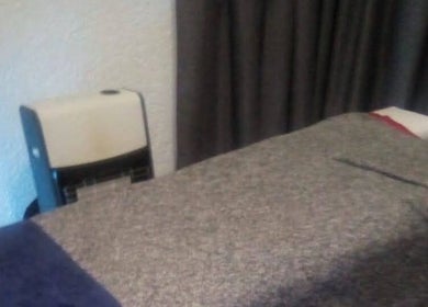 Cozy massage bed setup at Devine Relaxation Massage Studio, Cape Town, Western Cape, ZA.