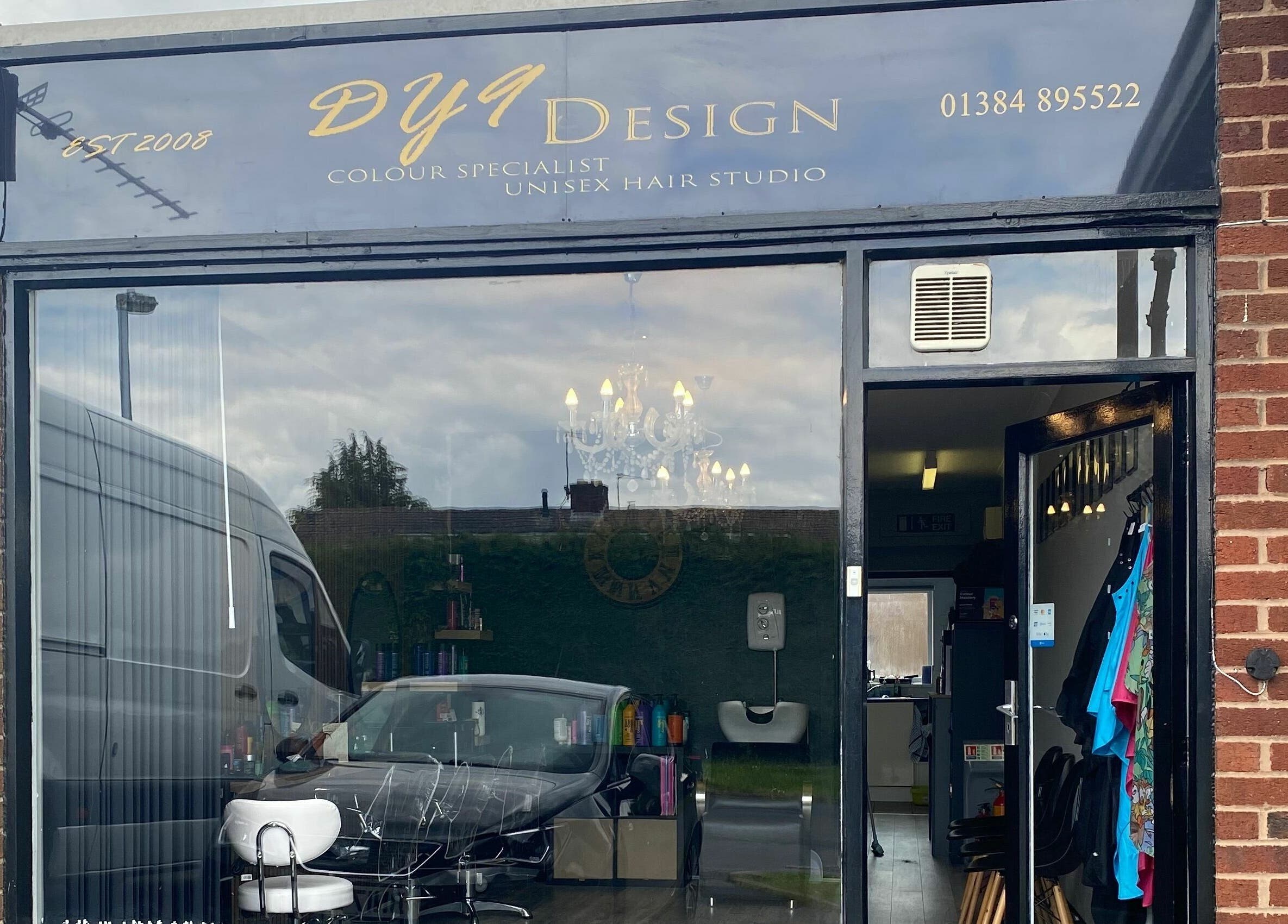 Exterior of Dy9 Design hair studio in Stourbridge, England, showcasing modern design and signage.