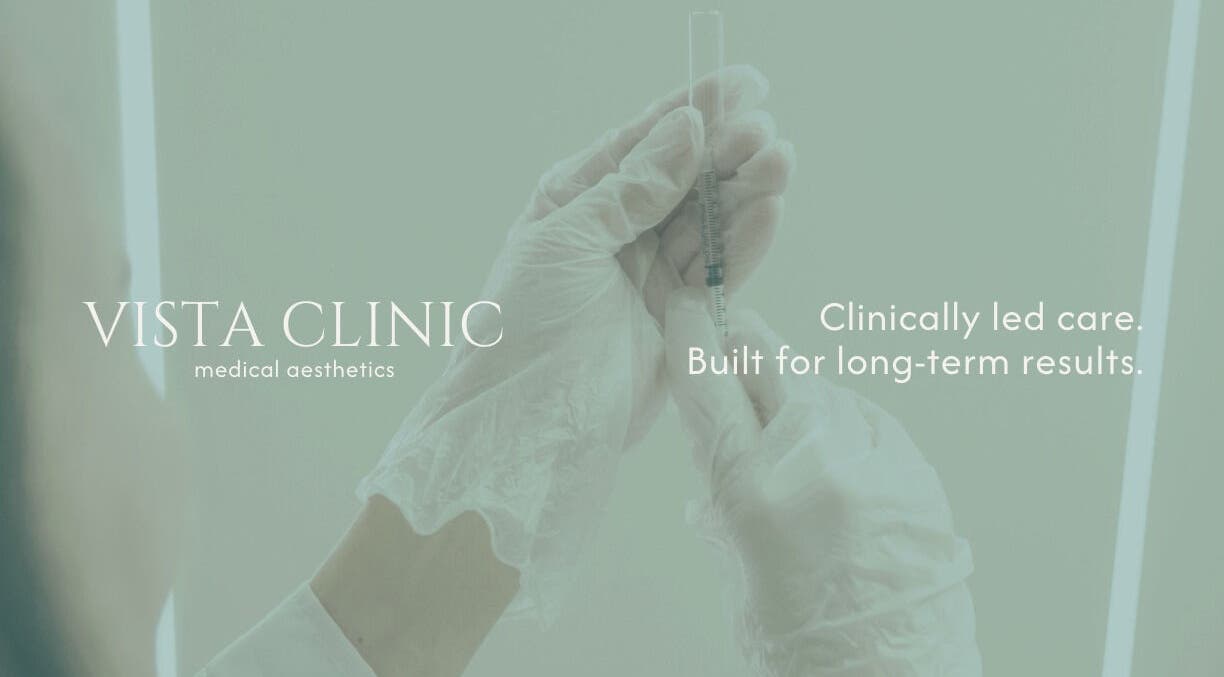 Doctor at Vista Clinic Medical Aesthetics in Dublin, IE, preparing injection with gloved hands.