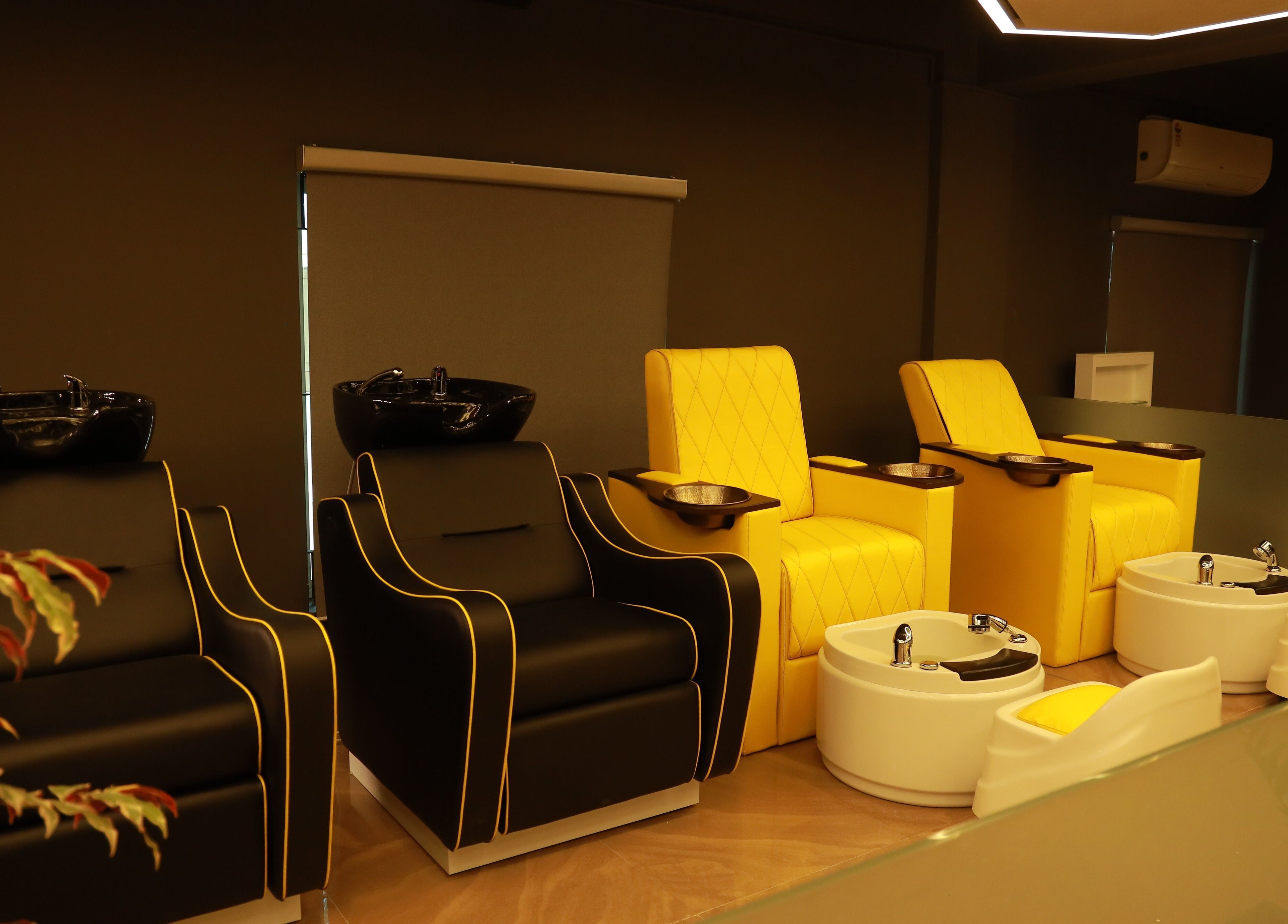Elegant pedicure chairs at One Touch Fit & Glam, Thiruvananthapuram, Kerala, IN, offering luxury wellness.