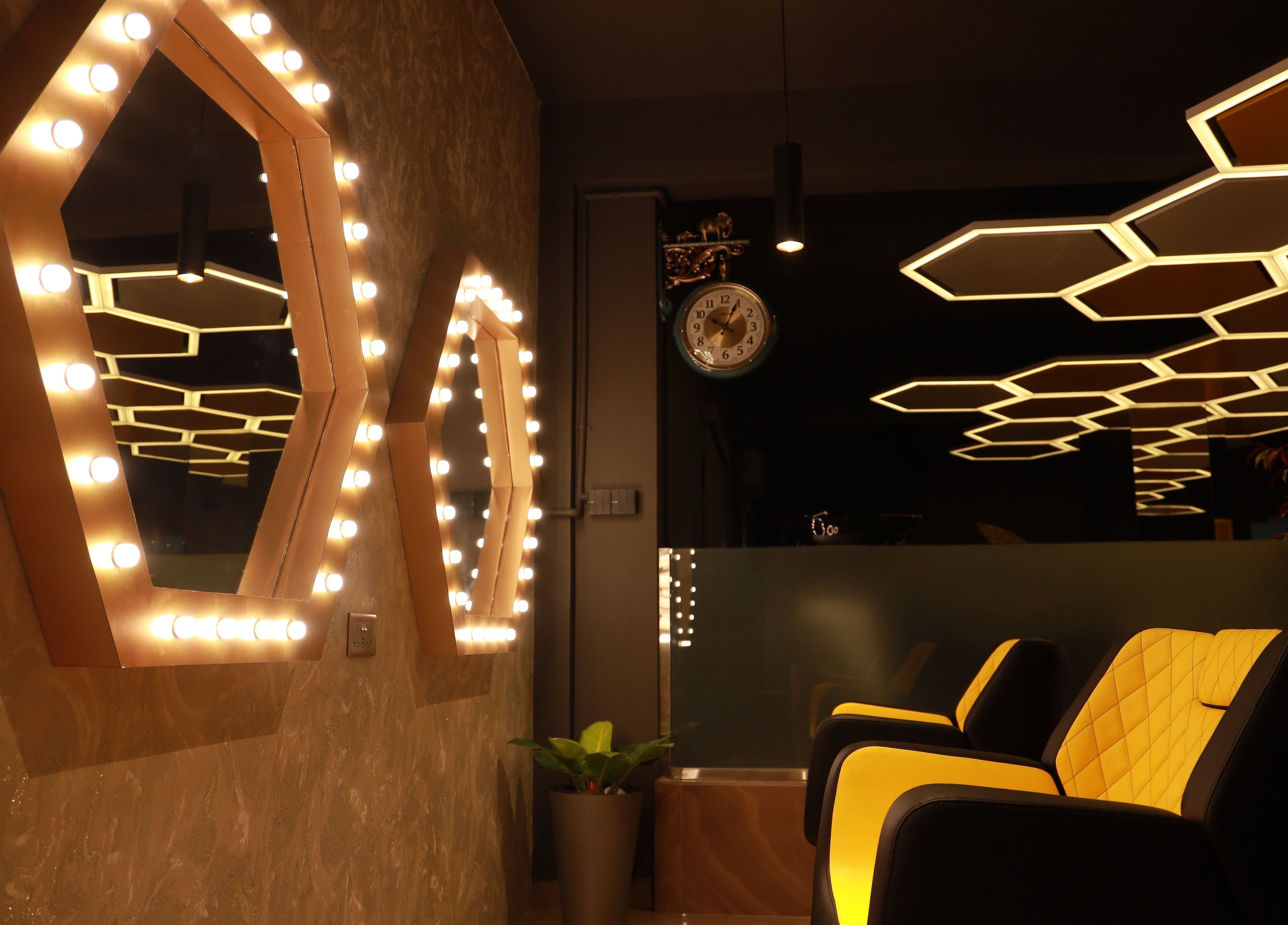 Chic interior with hexagonal lights at One Touch Fit & Glam, Thiruvananthapuram, Kerala, IN.