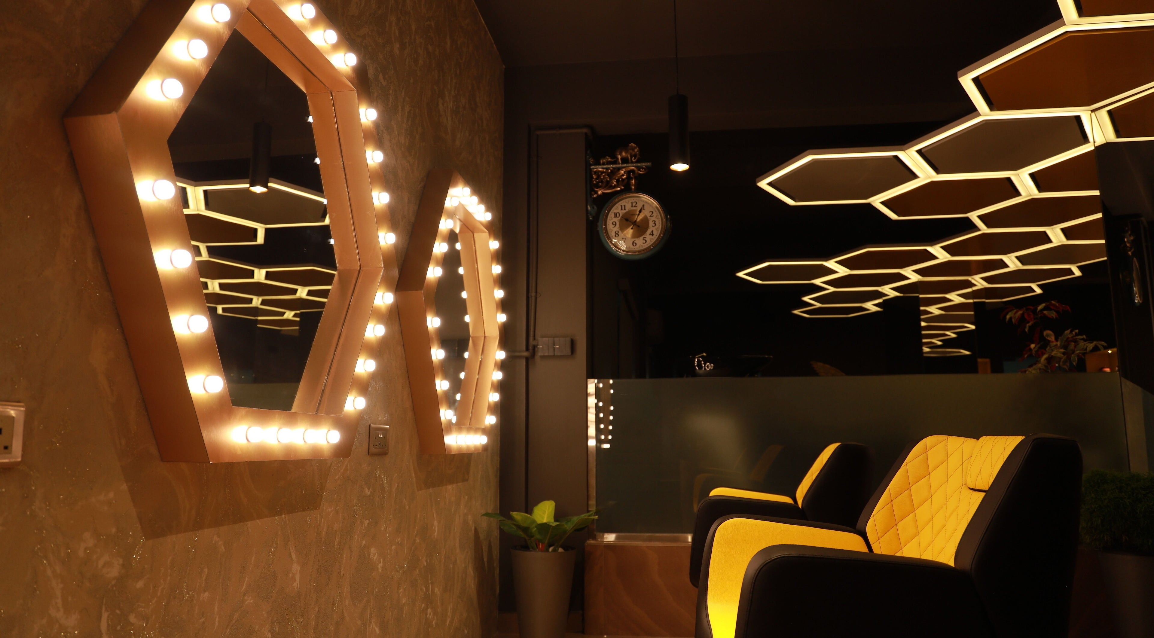 Chic interior with hexagonal lights at One Touch Fit & Glam, Thiruvananthapuram, Kerala, IN.