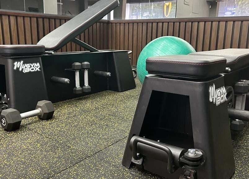 Modern gym equipment at One Touch Fit & Glam, Thiruvananthapuram, Kerala, IN, offering premium fitness experiences.