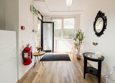 Welcoming entryway at Ana Clara Barreto Beauty, London, England, GB, featuring elegant decor and natural light.