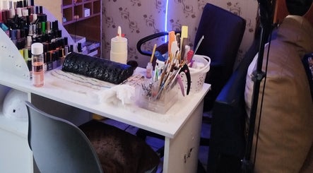 Nail styling station at TheTouch by leoRock, Johannesburg, Gauteng, ZA, showcasing tools and polish collection.