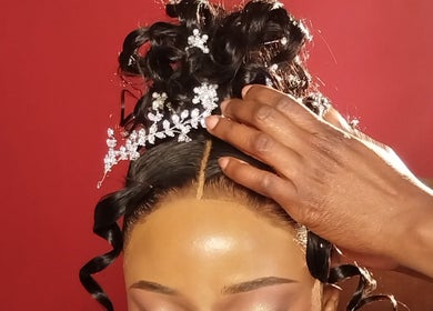 Intricate bridal hairstyle adorned with ornaments at TheTouch by leoRock, Johannesburg, Gauteng, ZA.