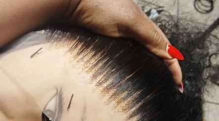 Close-up of detailed hair styling at TheTouch by leoRock, Johannesburg, Gauteng, ZA showcasing precision.