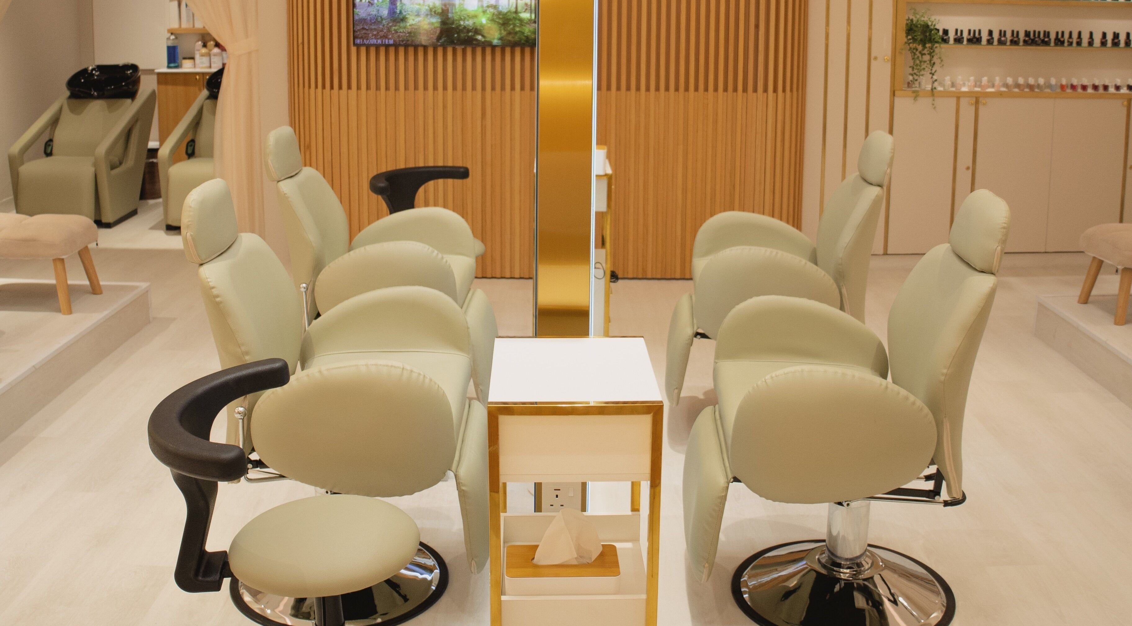 Elegant, plush chairs at Shimmer & Shine Salon, Dubai, AE, offering a serene beauty experience.