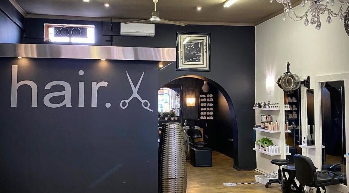Modern salon interior at TD Hairstudio in Cape Town, Western Cape, ZA, featuring stylish decor and beauty products.