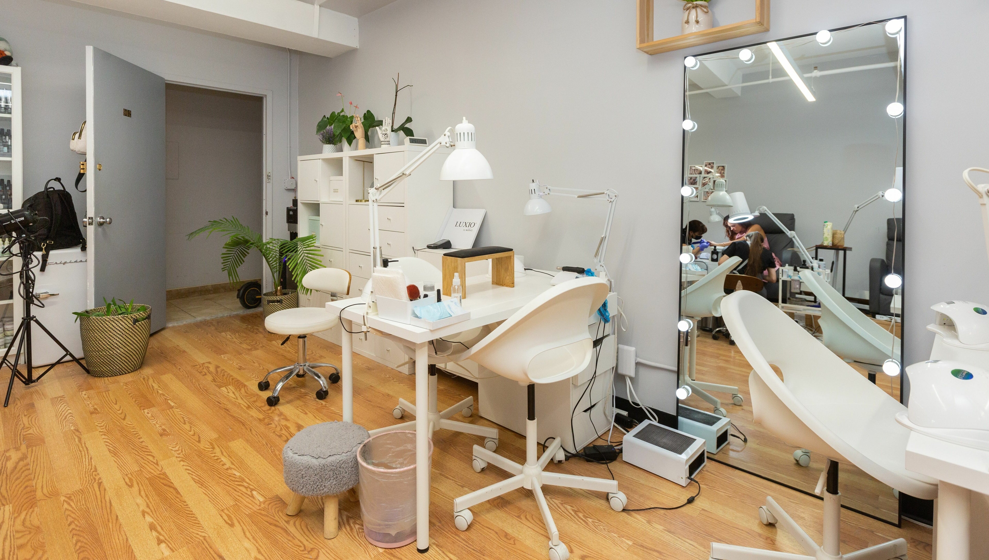 Modern nail salon setup at Zaranailsnyc, New York, United States, US with stylish decor and professional equipment.