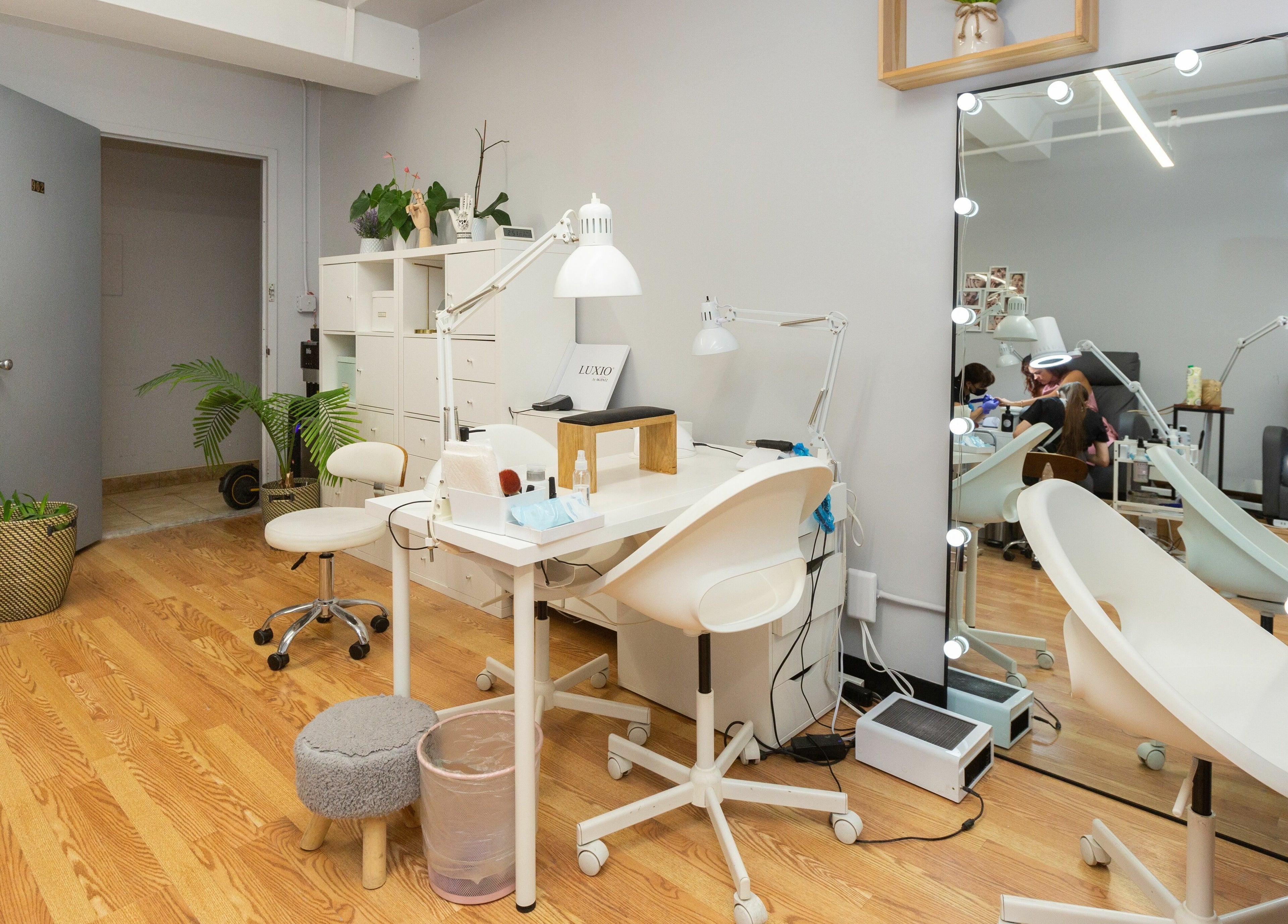 Modern nail salon setup at Zaranailsnyc, New York, United States, US with stylish decor and professional equipment.